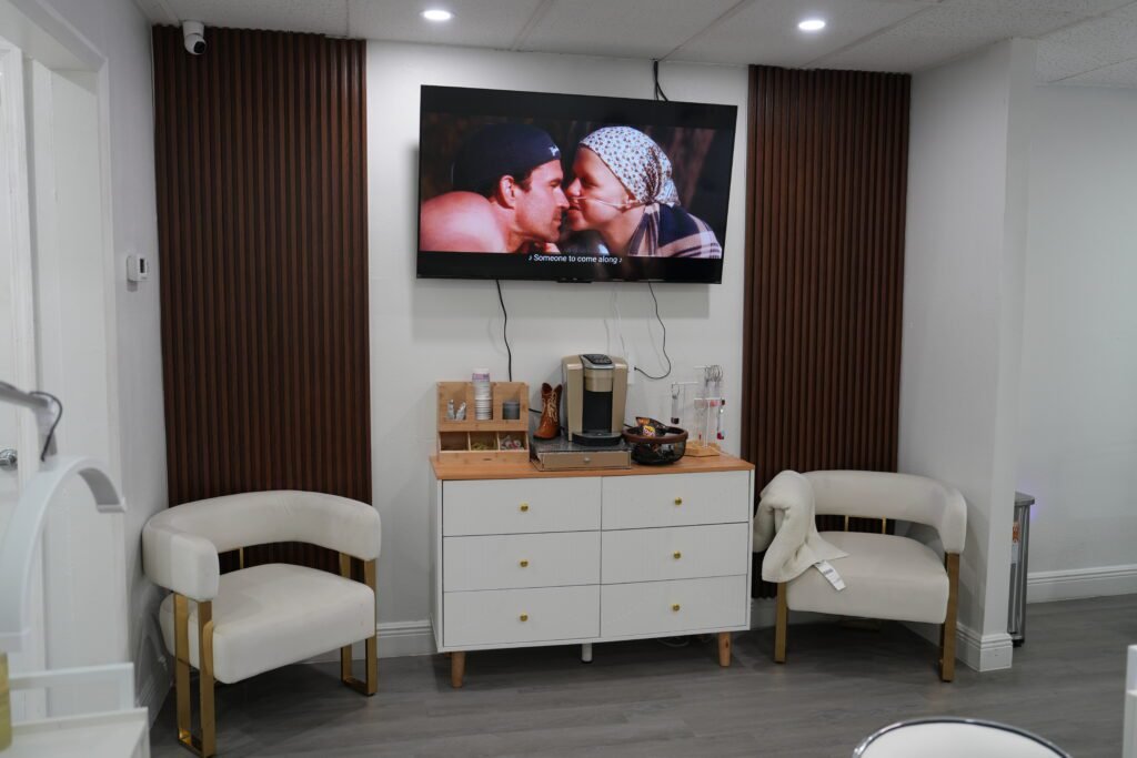 Cozy nail salon interior during dry manicure near me in Tampa, Florida.