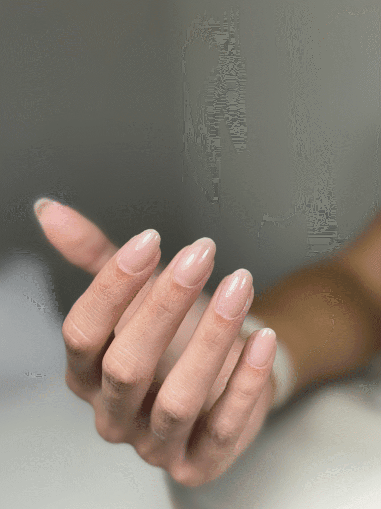 Elegant russian nails manicure in Tampa, Florida — natural nude finish.