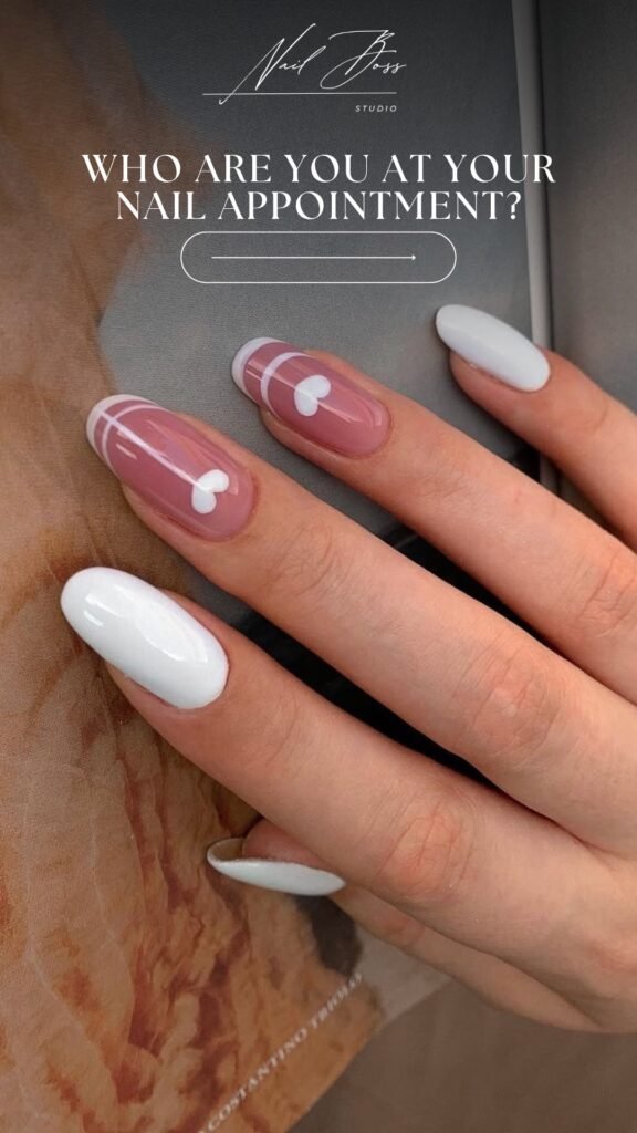 Pink and white heart nail design created during Tampa Russian nails service at Nail Boss Studio Tampa.