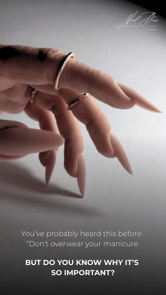 Close-up hand with long nails illustrating dry manicure care guidance in Tampa, Florida.