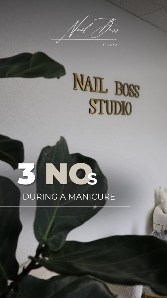 Interior of a modern nail studio in Tampa featuring signage and plants during a russian manicure in Tampa.