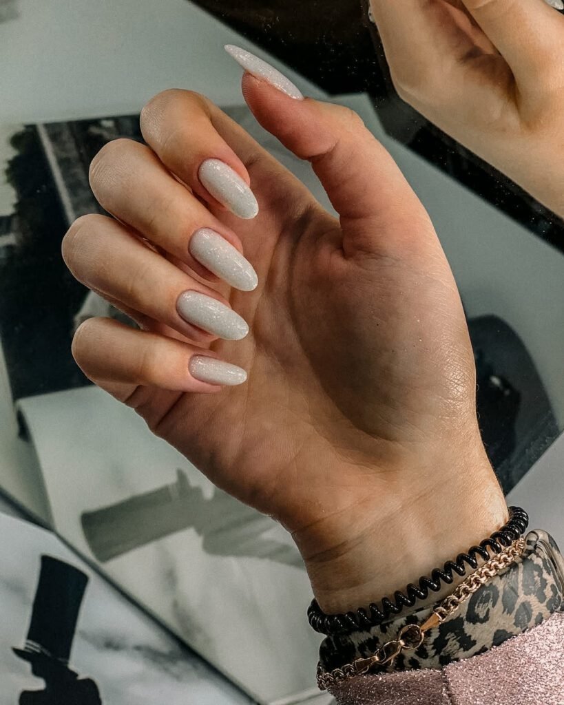 Milky white almond nails after russian manicure at Nail Boss Studio in Tampa, Florida.