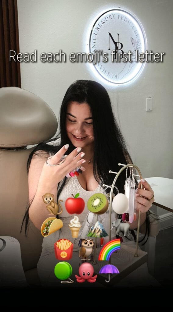 Woman choosing nail colors during a russian manicure at a studio in Tampa, Florida.