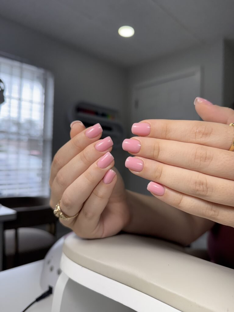 Soft pink nails after russian manicure in Tampa, Florida.