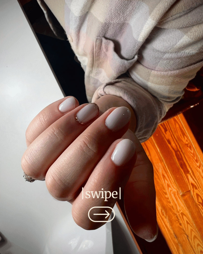 Close-up of soft white nails after russian manicure Tampa, Florida sunlight reflection.