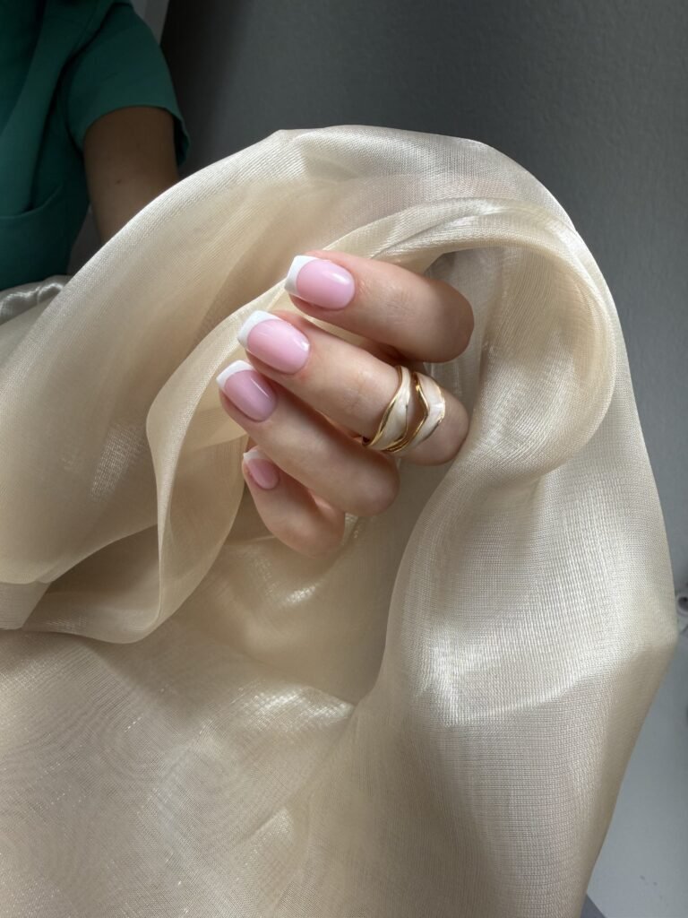 Soft pink French nails after russian manicure at Nail Boss Studio in Tampa, Florida.