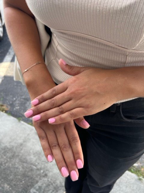 Soft pink manicure at russian nail salon in Tampa, Florida.
