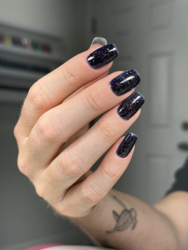dark glitter russian nails in Tampa created at a professional studio