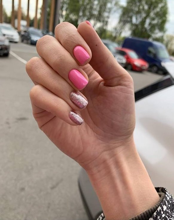 Pink glossy nails created with builder gel manicure in Tampa, Florida