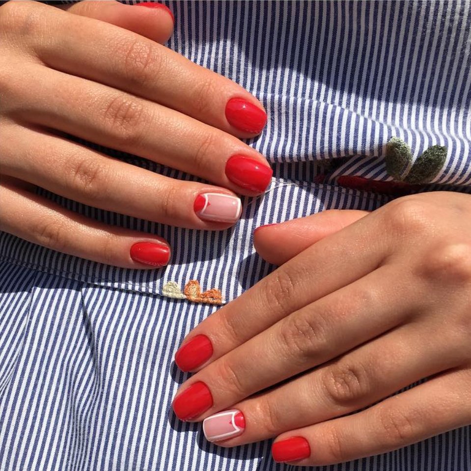 Red and nude builder gel manicure with modern design at Nail Boss Studio in Tampa
