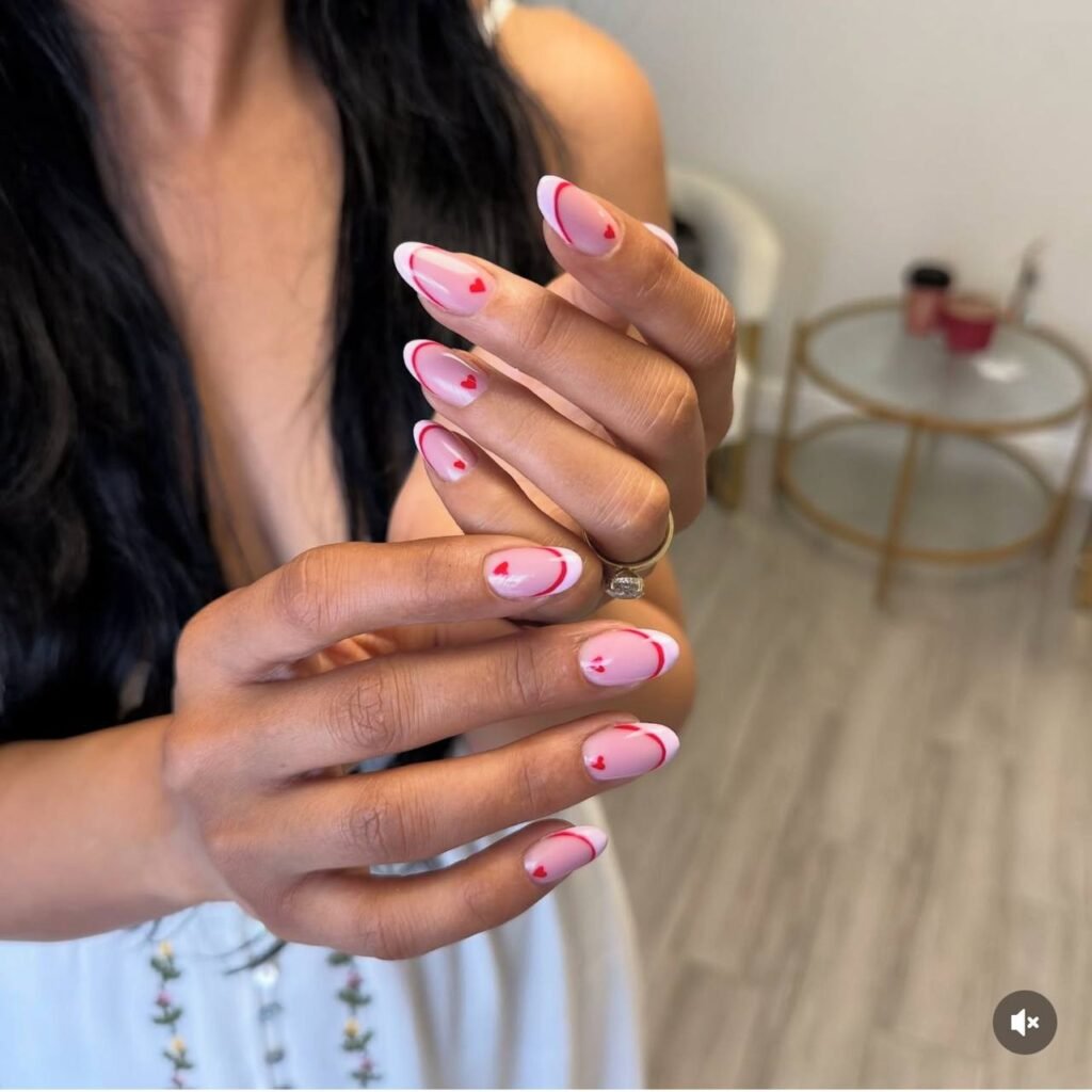 Dry manicure Tampa with clean cuticles, soft pink polish and refined nail shape at Nail Boss Studio.