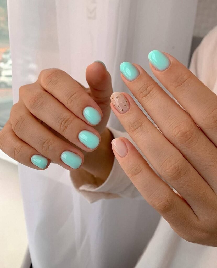 dry manicure tampa with clean cuticles and glossy mint finish in Tampa Florida