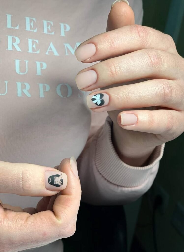 Natural nude nails with design after a dry manicure in Tampa, Florida