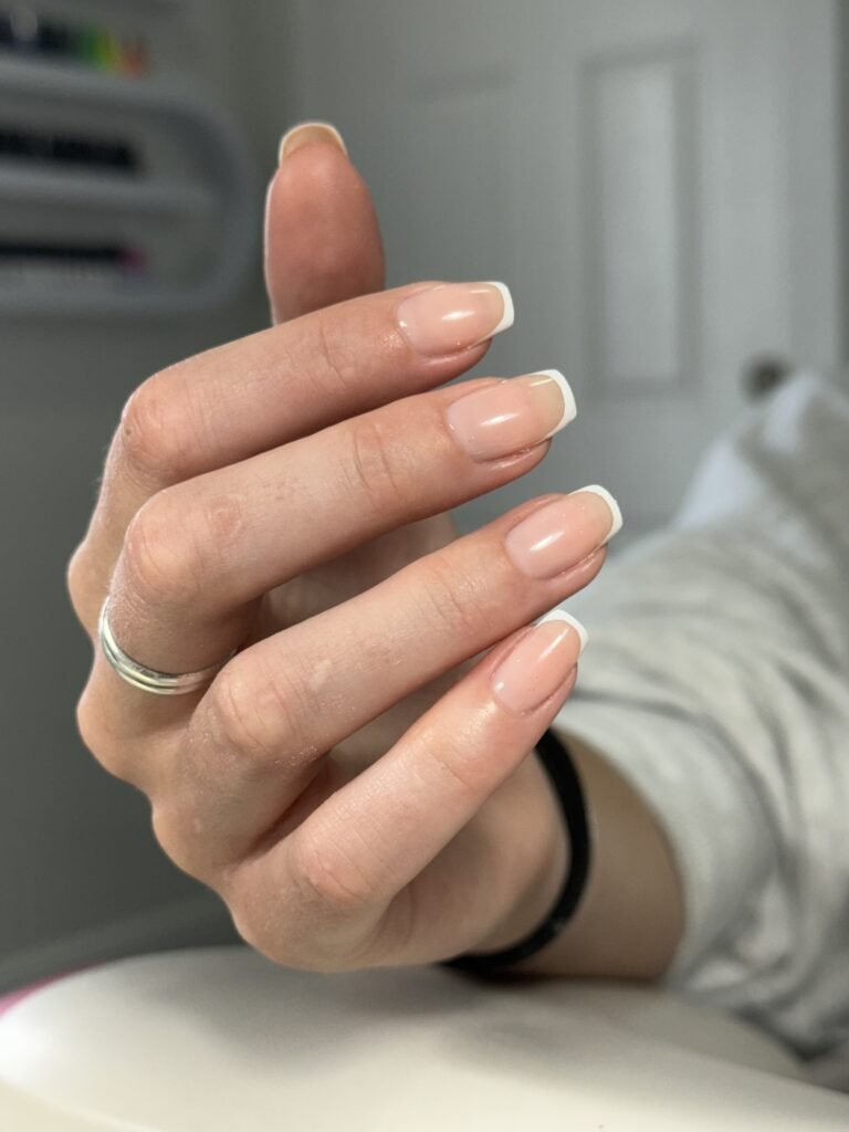 Soft natural nails after a dry manicure in Tampa with clean office-friendly polish.