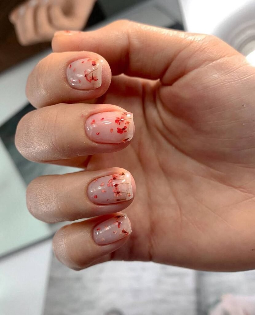 Soft natural nails with floral design created using european manicure technique in Tampa, Florida.