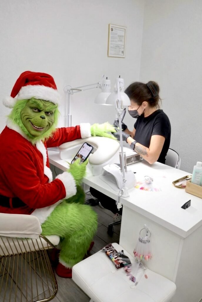 Client receiving russian manicures Tampa with dry manicure technique at Nail Boss Studio.