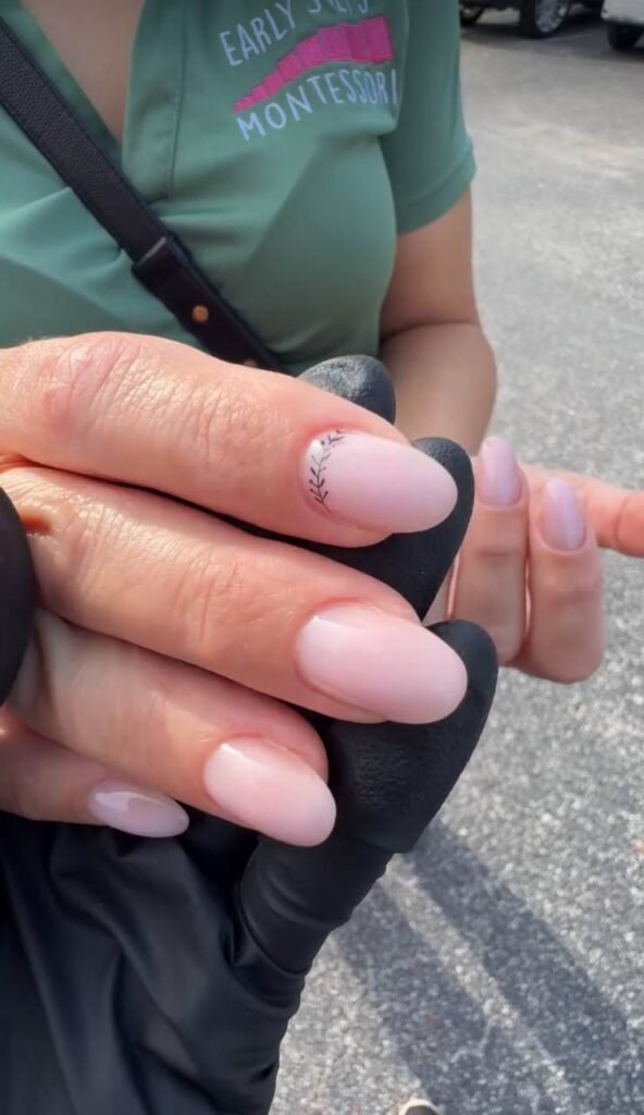Russian manicures Tampa with clean cuticles and soft nude nail design.