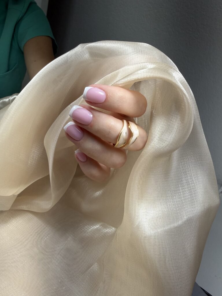 Soft French nails created after russian manicures Tampa in a bright Tampa studio.