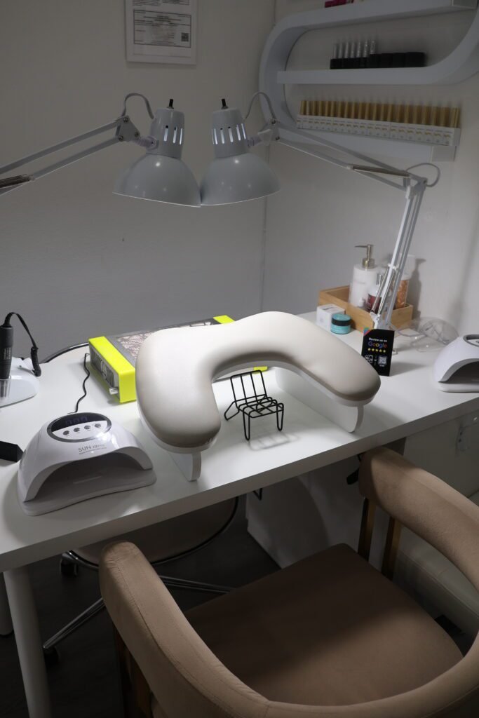 professional russian nail salon workspace in Tampa with lamps and manicure setup