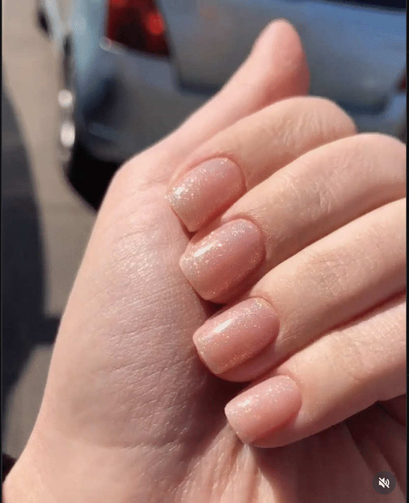 Russian nails with natural shimmer finish created in Tampa using modern manicure techniques.