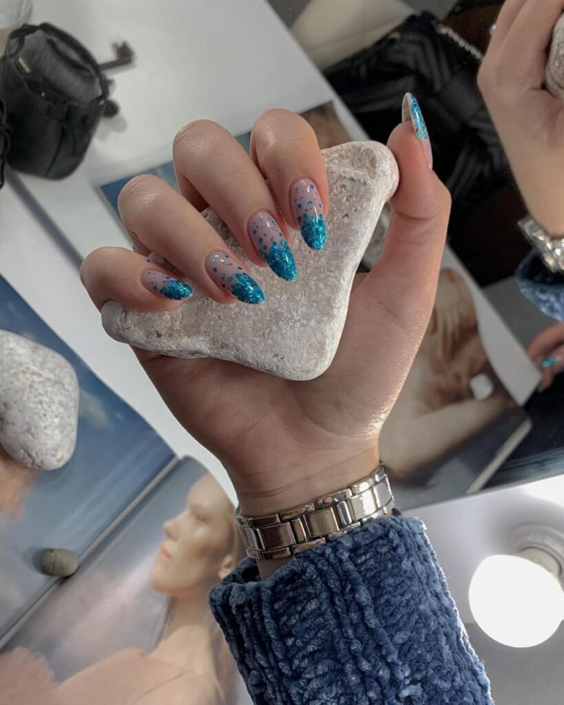 Bright blue glitter russian nails captured in Tampa at Nail Boss Studio.
