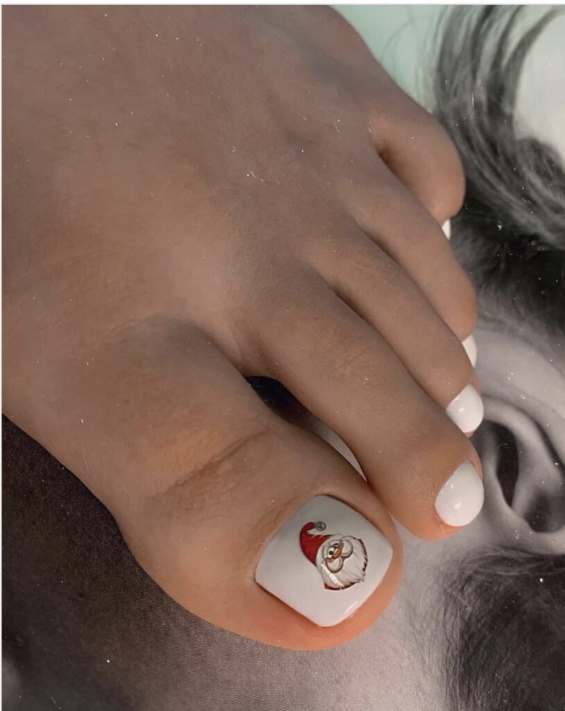 Smart pedicure with holiday nail design at Nail Boss Studio Tampa.