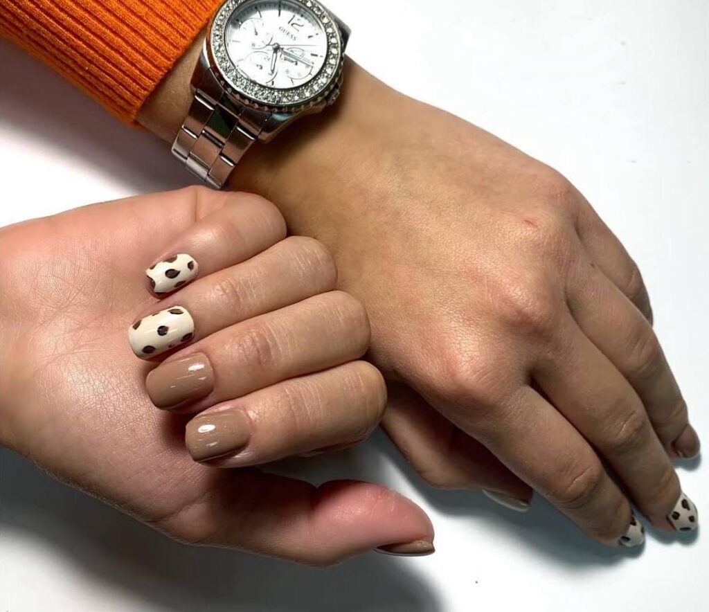 Clean neutral russian manicure salon work in Tampa, Florida with balanced shape and soft tones.