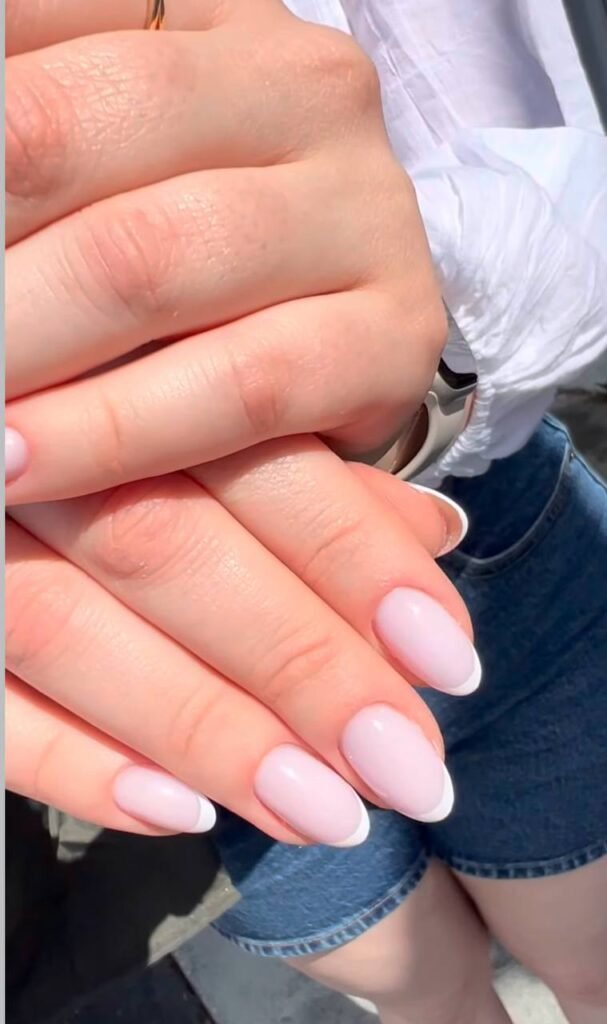 Soft pink builder gel manicure on natural nails in Tampa, Florida, clean dry manicure technique