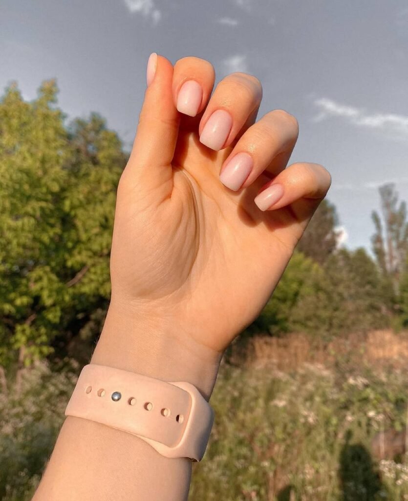 Natural builder gel manicure on short nails in Tampa Florida with clean glossy finish