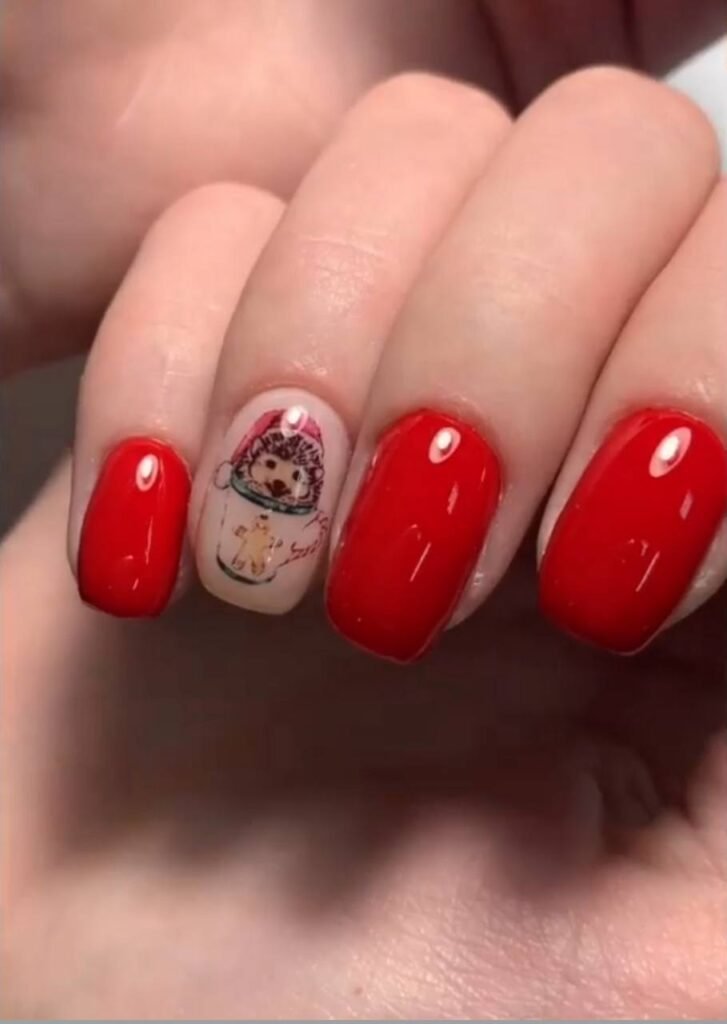Builder gel Tampa manicure with elegant red nails and detailed accent design in Tampa, Florida.