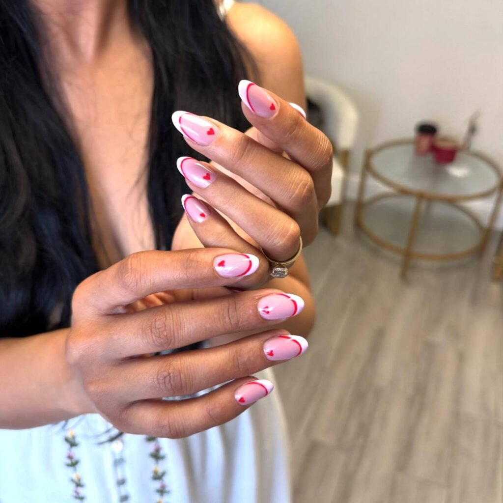 Builder gel Tampa manicure with clean cuticles and soft pink design at Nail Boss Studio in Tampa