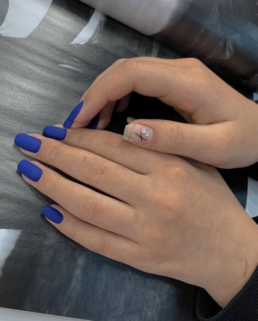 Elegant matte blue nails showing russian manicures near me performed in Tampa, Florida