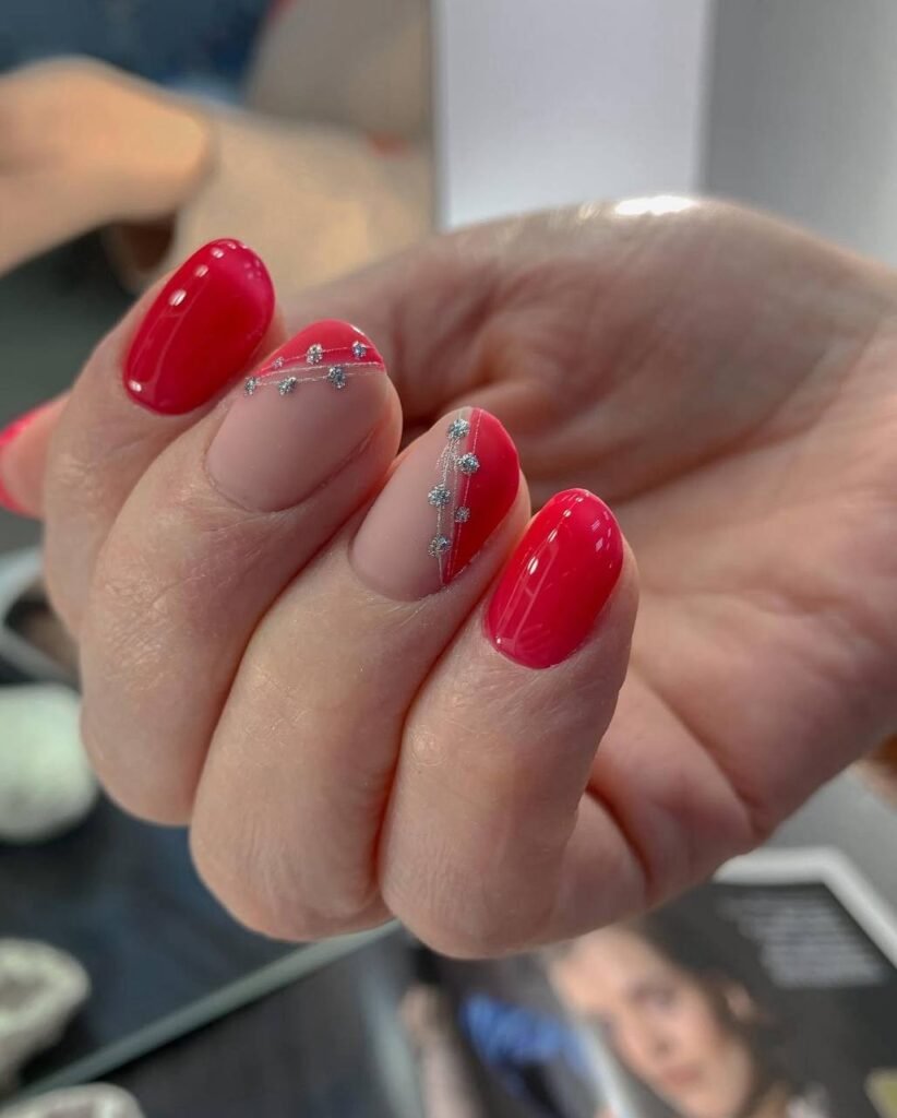 European manicure with red gel design and fine details in Tampa, Florida at Nail Boss Studio