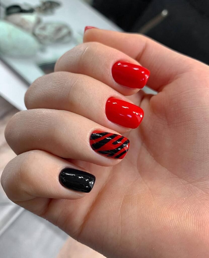 Hard gel russian manicure with red and black design in Tampa Florida