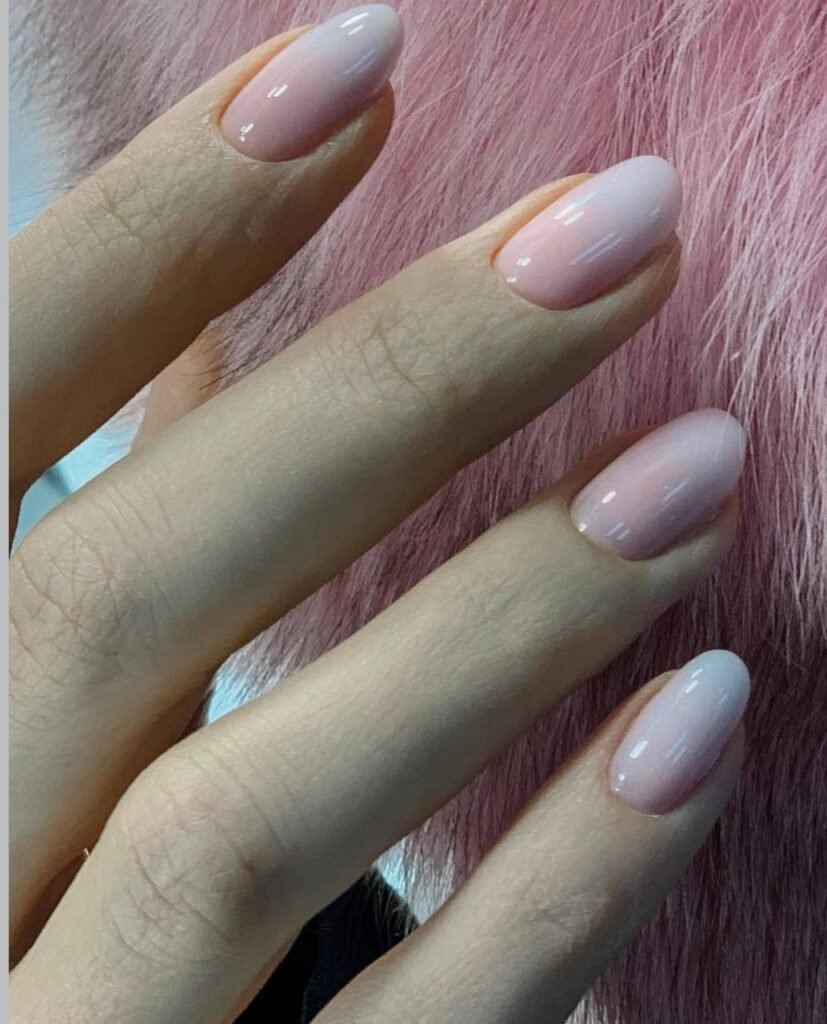 Soft blush russian manicure near me in Tampa with clean cuticles and natural shine