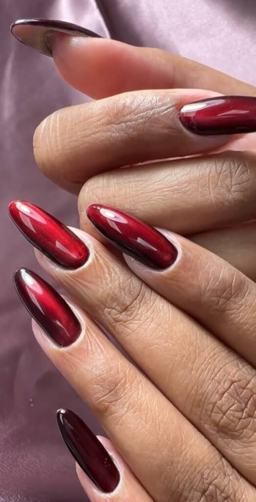 Elegant almond nails with deep red builder gel, russian manicure salon style in Tampa