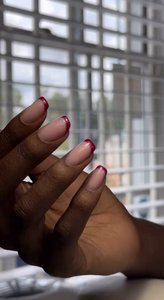Close-up of clean natural nails after russian manicure Tampa with soft pink finish in Florida