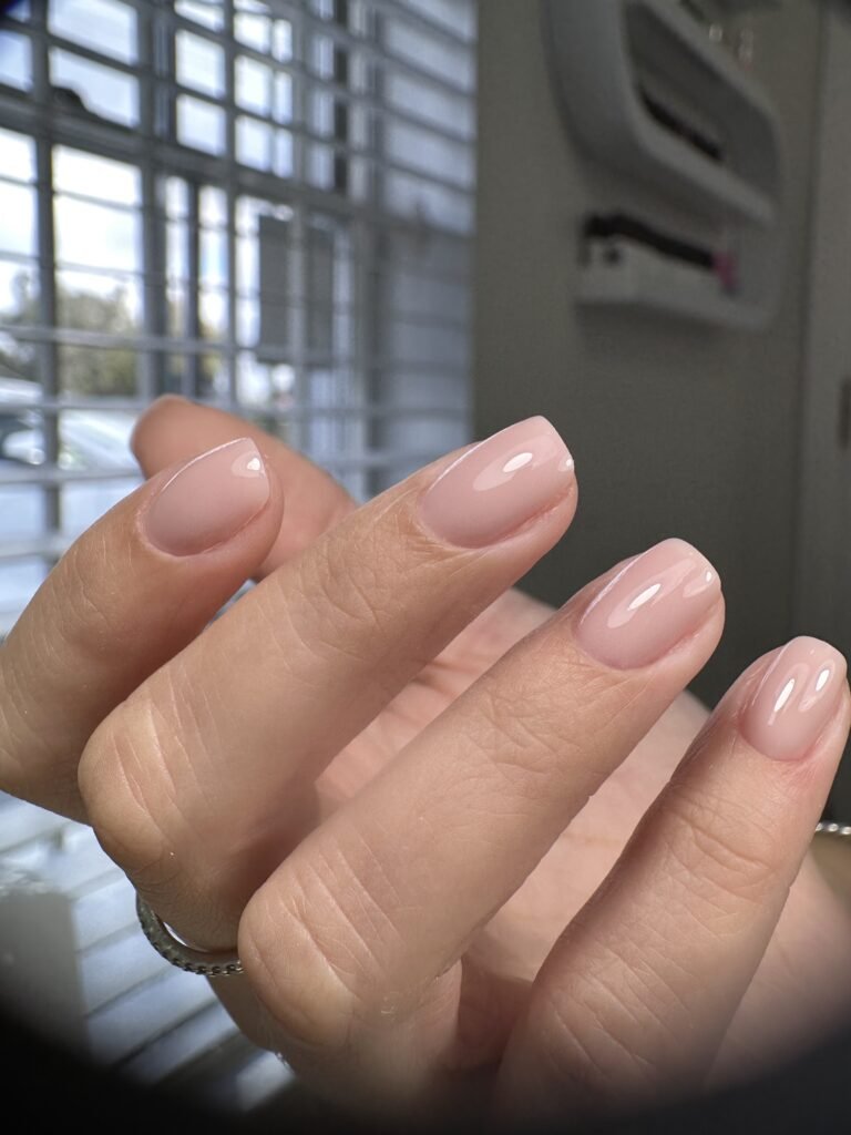 Natural pink russian manicure with precise cuticles in Tampa, Florida
