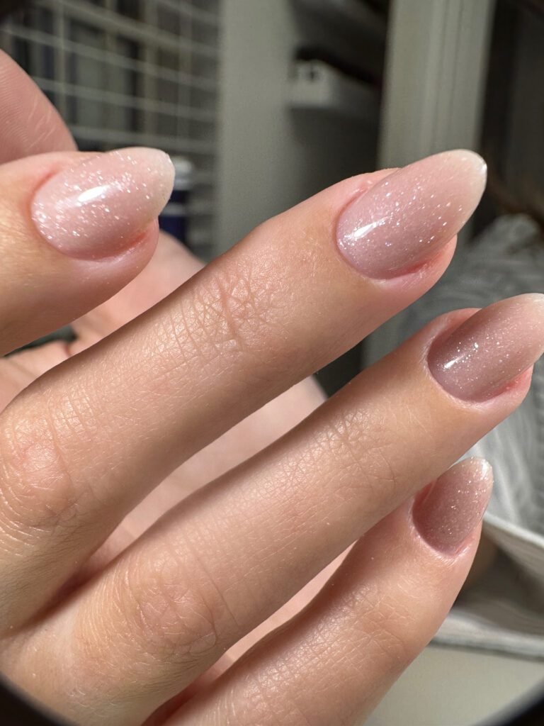 Natural glossy nails created at a russian nail salon in Tampa, Florida with builder gel structure.