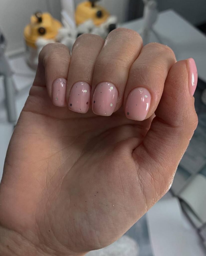 Soft pink manicure created at a russian nail salon near me in Tampa, Florida by Nail Boss Studio