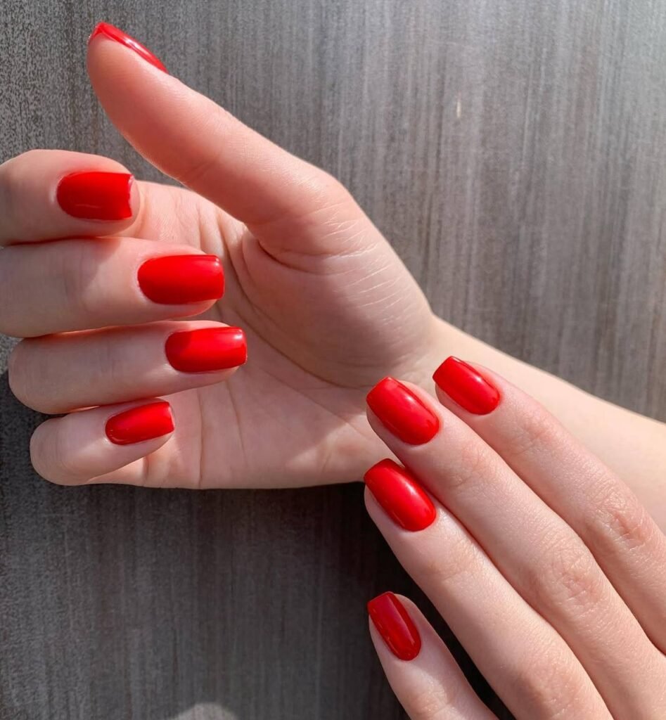 Elegant red manicure showcasing precision work at a russian nail salon in Tampa, Florida