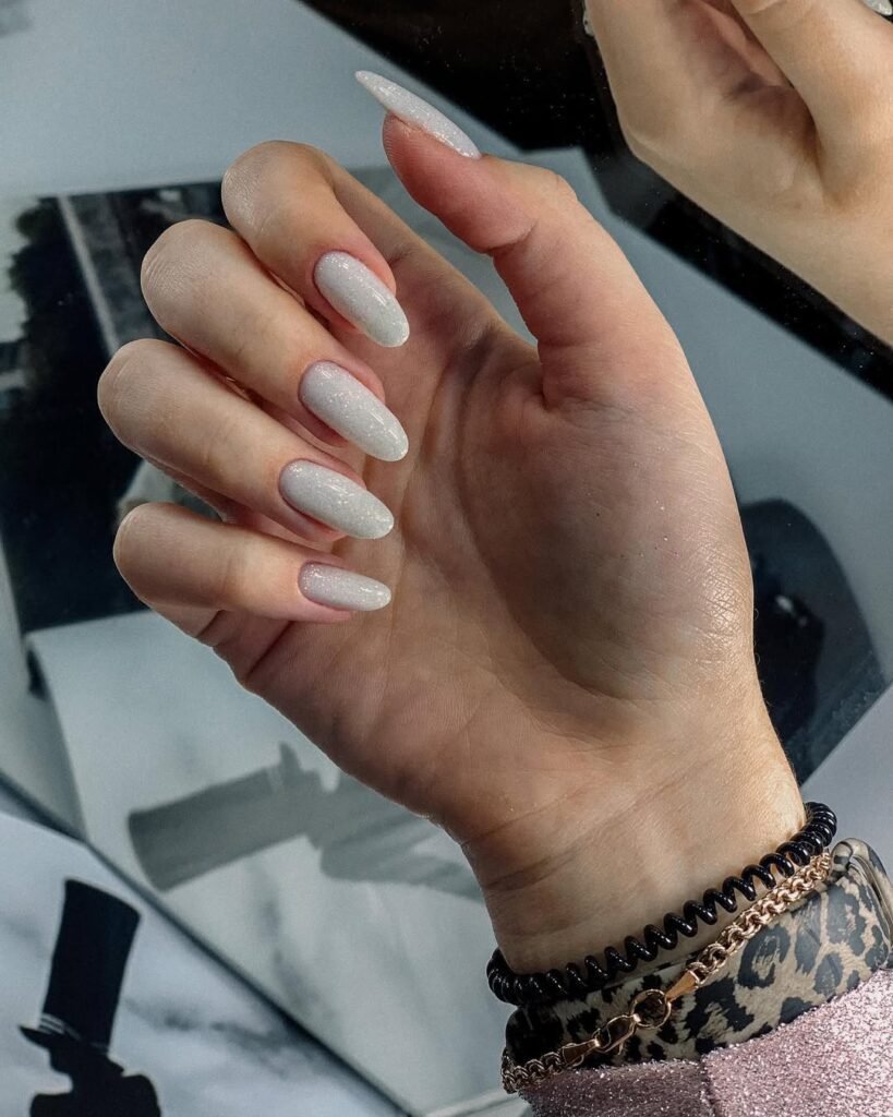 White gel Russian Manicure Tampa with clean cuticle work and long almond shape at Nail Boss Studio