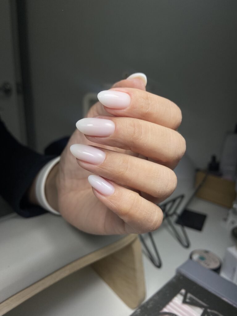 Natural builder gel manicure near me with soft milky finish in Tampa, Florida