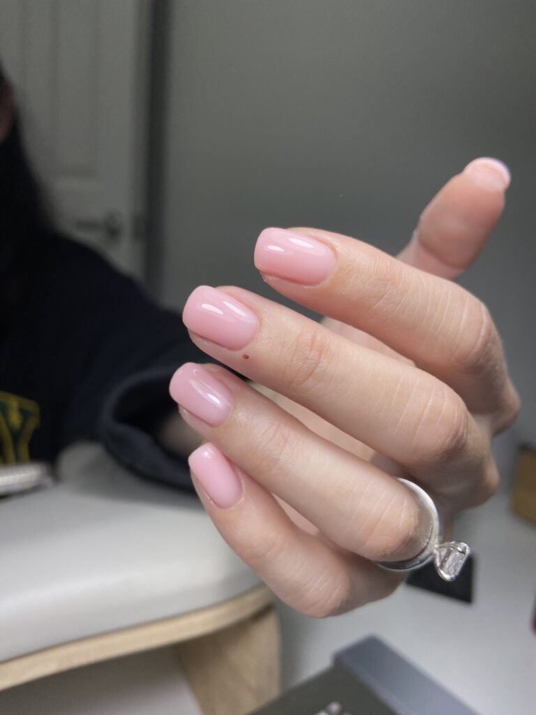 Soft pink builder gel manicure Tampa with clean cuticle work and natural shine