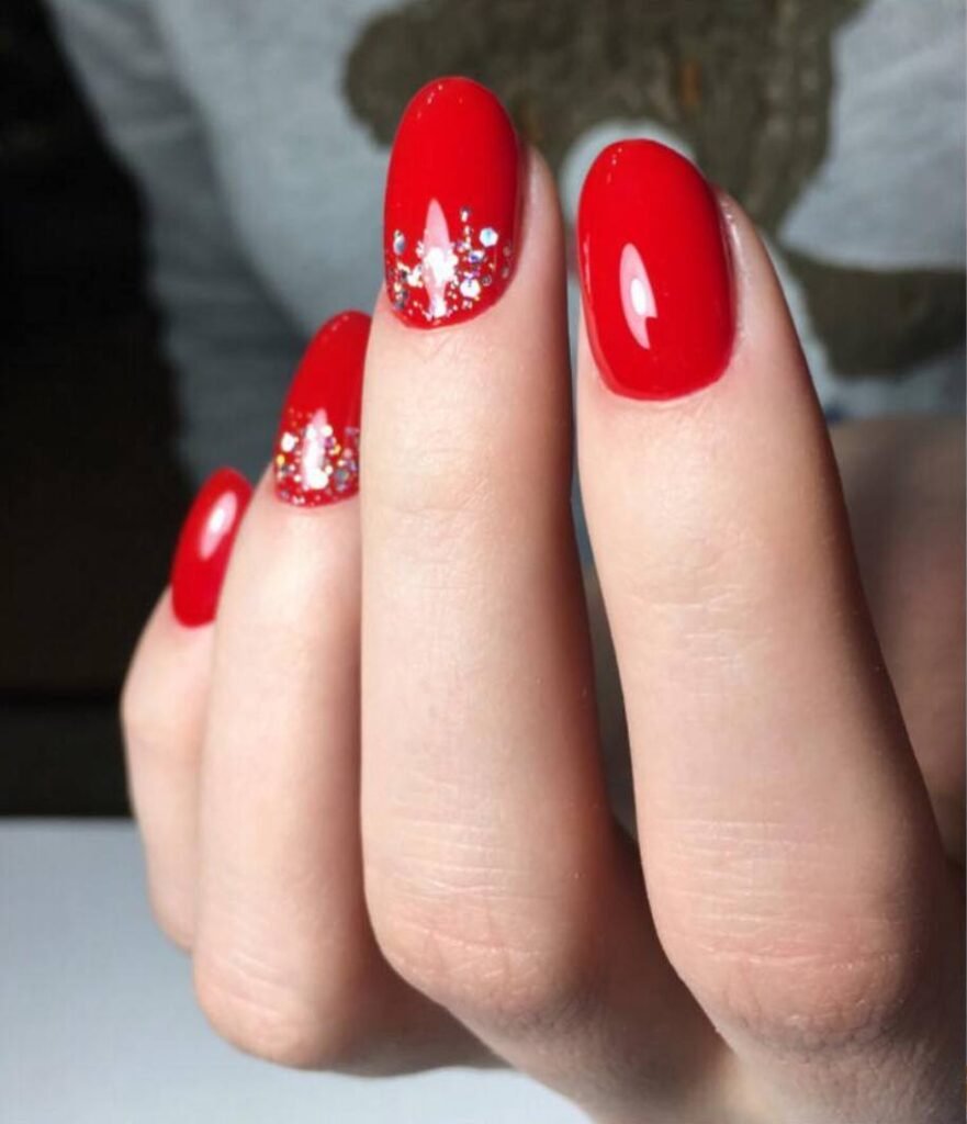 Elegant red european manicure near me with clean cuticles in Tampa, Florida