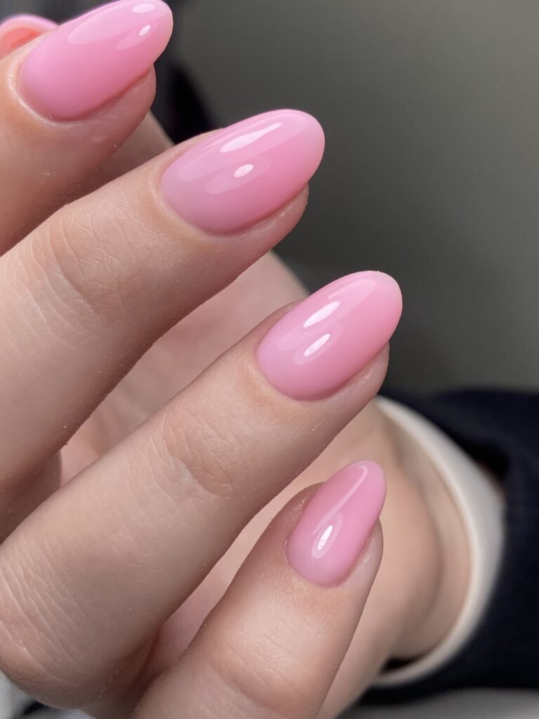 Soft pink european manicure near me with natural shape in Tampa Florida