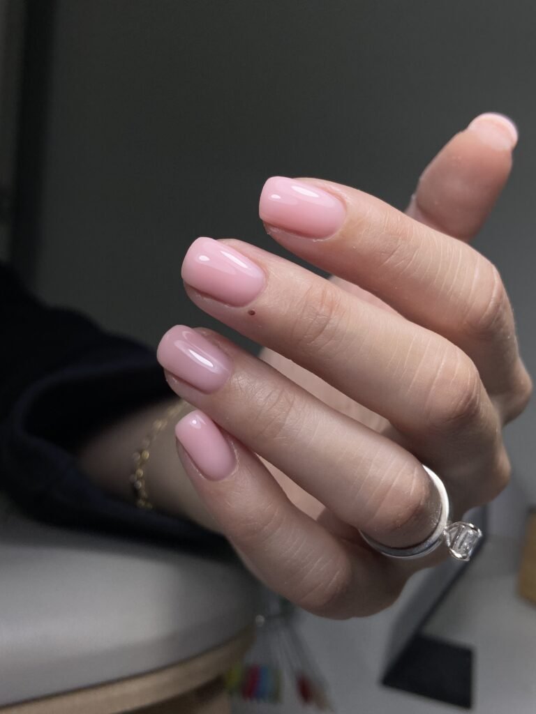 Natural pink hard gel russian manicure on short nails in Tampa, Florida at Nail Boss Studio