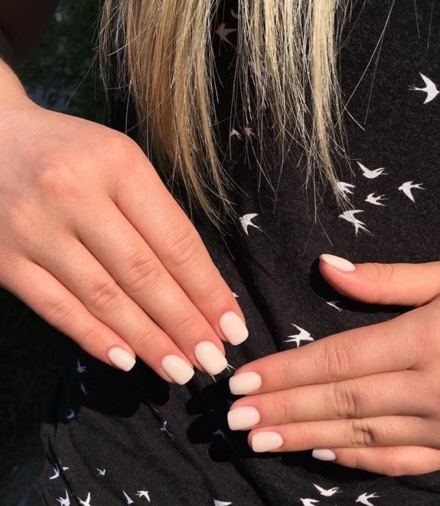 Soft milky nude nails with russian Manicure near me technique in Tampa, Florida at Nail Boss Studio.