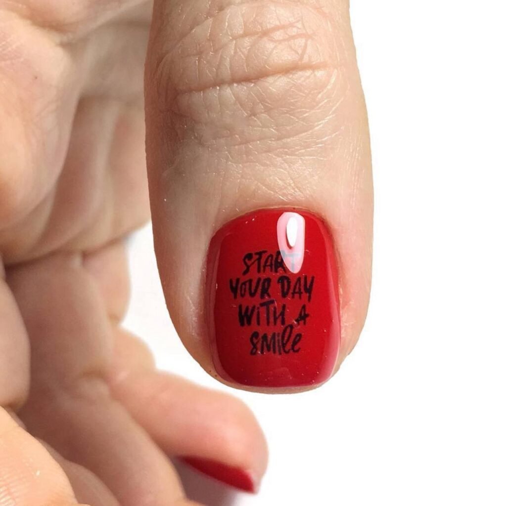 Close-up of glossy red russian manicures Tampa with precise cuticle work in Tampa, Florida.