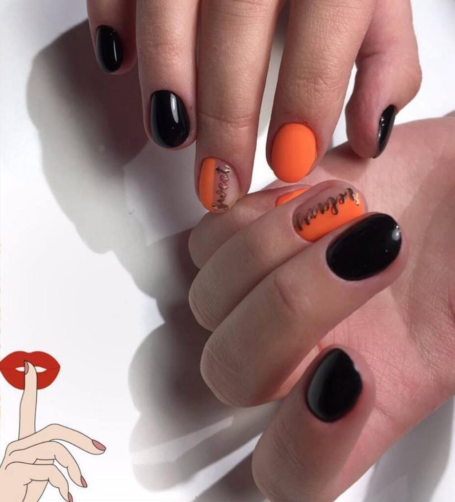 Elegant black and orange nail design created with russian manicures Tampa technique at Nail Boss Studio in Tampa, Florida.